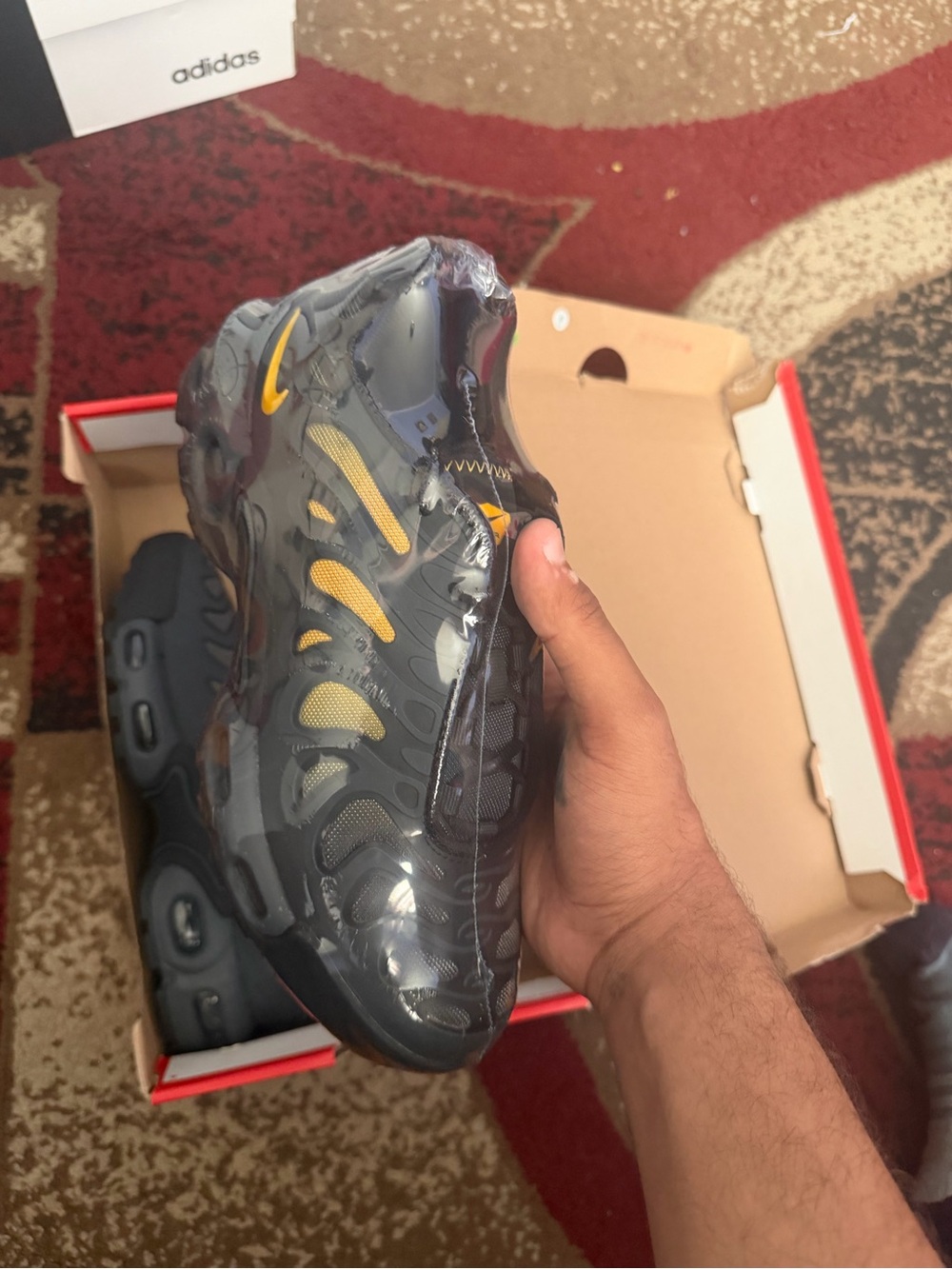 Nike Black and Yellow VaporMax Plus Sneakers